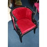 A black painted Regency style armchair