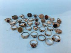 A large quantity of '925' stamped rings etc. total weight 111.1 grams