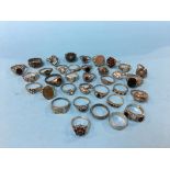 A large quantity of '925' stamped rings etc. total weight 111.1 grams