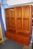 A G Plan teak four door bookcase, with cupboards below