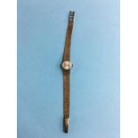 A ladies Seiko 9ct gold watch and strap, total weight 21.3 grams