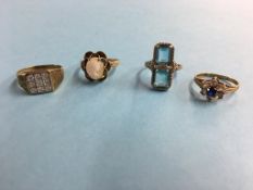 Three 9ct gold dress rings and one stamped 14ct, total weight 11.2 grams (4)