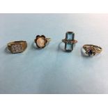 Three 9ct gold dress rings and one stamped 14ct, total weight 11.2 grams (4)