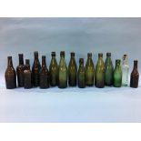 Fifteen glass advertising bottles 'Newcastle' to include; 2 Robert Newton, 2 Emmerson Bros.,