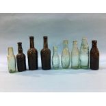 Nine glass advertising bottles, NE Breweries, Blackhill, G. S. Smart, Alnwick, Alnwick Brewery