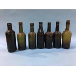 Seven glass advertising bottles 'Sunderland' to include; Elwen, T. Elwen and Son, R. Fenwick and Co.