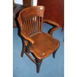 A 1930s oak office chair