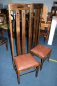 After Charles Rennie Mackintosh, a pair of oak high back single chairs