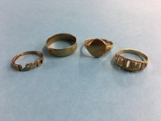 Three 9ct gold rings, weight 9.6 grams