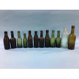 Twelve glass advertising bottles 'South Shields' to include; P. V. Tinwell, R. Henderson, M. Wood