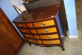 An American Williamsburg bow front chest, with four long drawers, 104cm wide