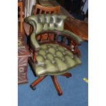 A Chesterfield green leather office chair