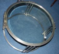 A modern chrome two tier circular glass coffee table, 84cm diameter