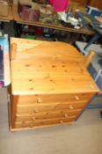 Two pine chest of drawers and a headboard