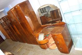 An Art Deco walnut three piece bedroom suite