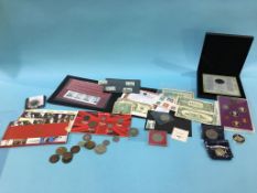 Various coins and notes to include eight reales, silver dollar etc.