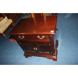 A reproduction mahogany Stickley side cabinet, 66cm wide