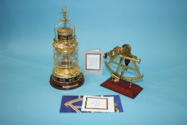 Reproduction model sextant and a ships lamp