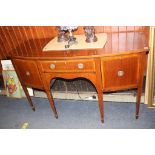 An Edwardian mahogany bow front sideboard