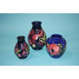 Three Moorcroft vases 20 cm 13 cm & 14 cm height