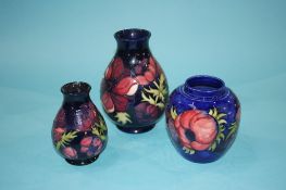 Three Moorcroft vases 20 cm 13 cm & 14 cm height