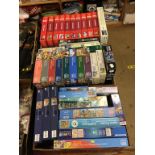 Three boxes of jigsaw puzzles