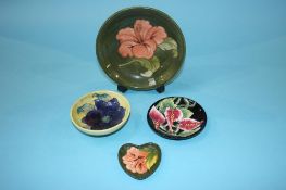 Three Moorcroft dishes and one other