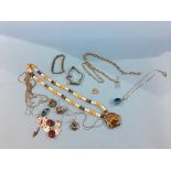 Silver Albert, assorted silver jewellery, amber coloured beads etc.