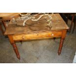 A pine single drawer side table, 107cm wide