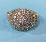 A 14kt diamond cluster ring, 5g, size N