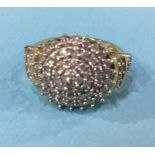 A 14kt diamond cluster ring, 5g, size N