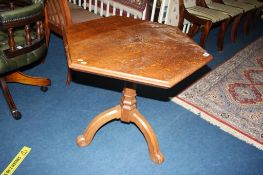 An octagonal oak drop flap table, 75cm wide