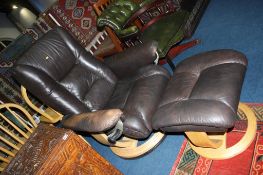 A brown leather swivel chair and footstool