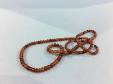 String of amber coloured beads