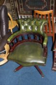 A Chesterfield green leather office chair