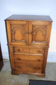 A carved oak cocktail cabinet, 70cm wide