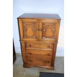 A carved oak cocktail cabinet, 70cm wide