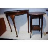 A half moon table and an oak occasional table