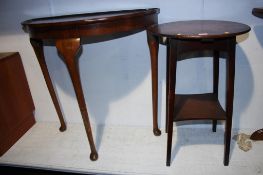 A half moon table and an oak occasional table