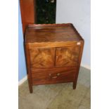 A Georgian mahogany commode