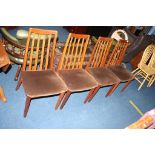 A set of four teak G Plan dining chairs