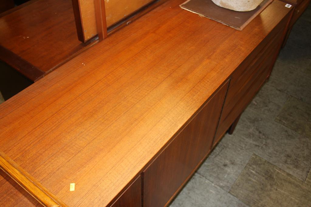 A British teak sideboard in the style of Arne Vodder for Sibast with two 'push' double doors flanked - Image 4 of 9