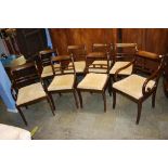 A set of eight Regency style dining chairs