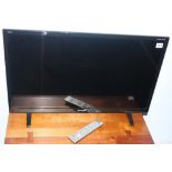 Sharp Aquos 32" TV (with remote)