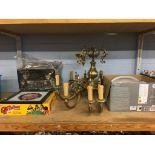 A shelf of assorted to include Prinz Magnon Duo projector, brass hanging light fitting etc.