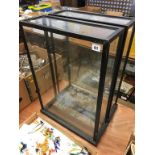 Two glass display cabinets