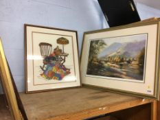 A shelf of framed prints and pictures, needlework etc.