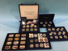 Quantity of various coin presentation sets to include 'The History of London' etc.