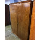 A mahogany fitted wardrobe