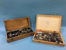 Two boxes of various gents and ladies watches